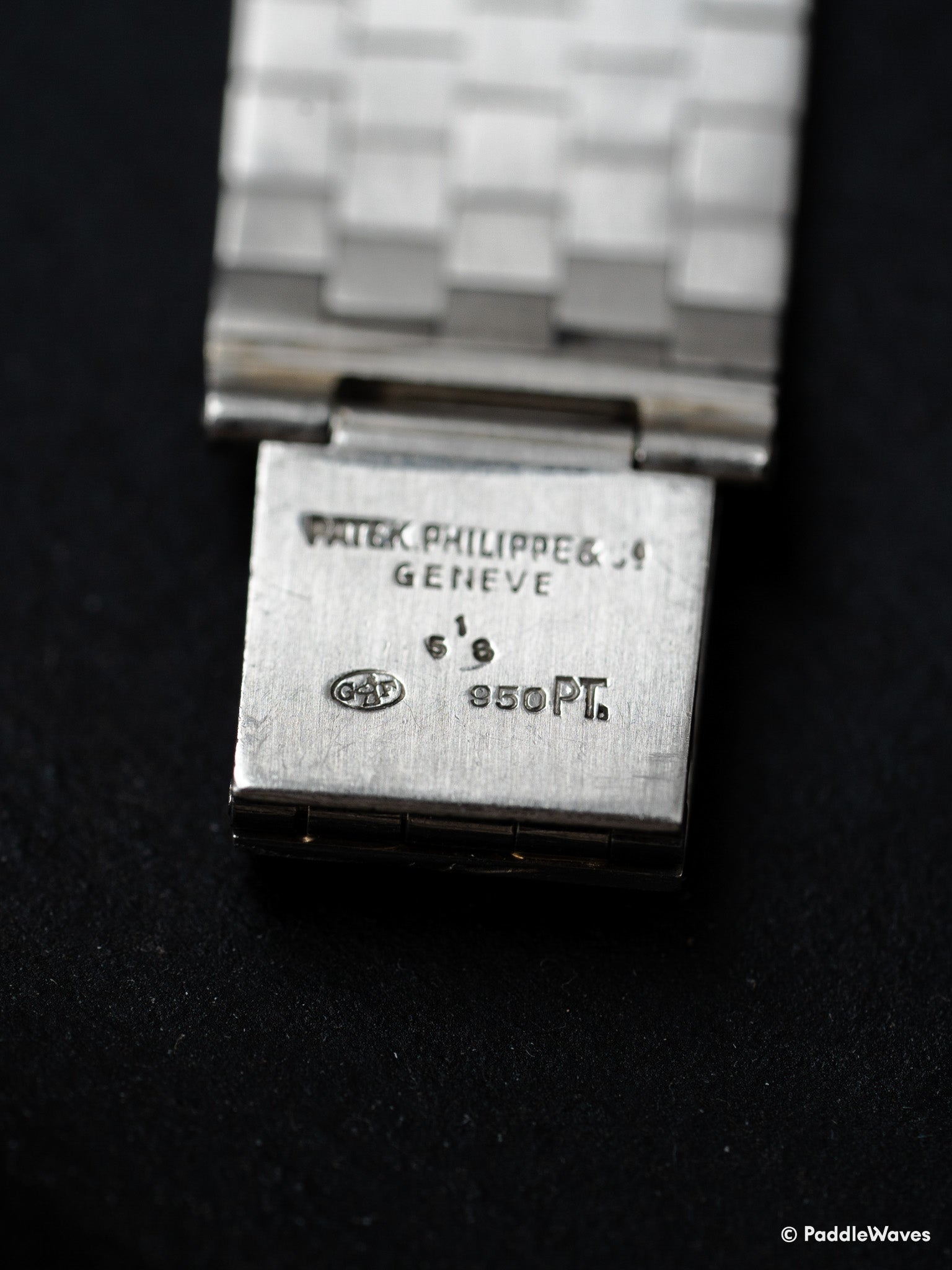 Close-up of Disco Volante with 'Patek Philippe & Co. Geneve' engraving on Bracelet