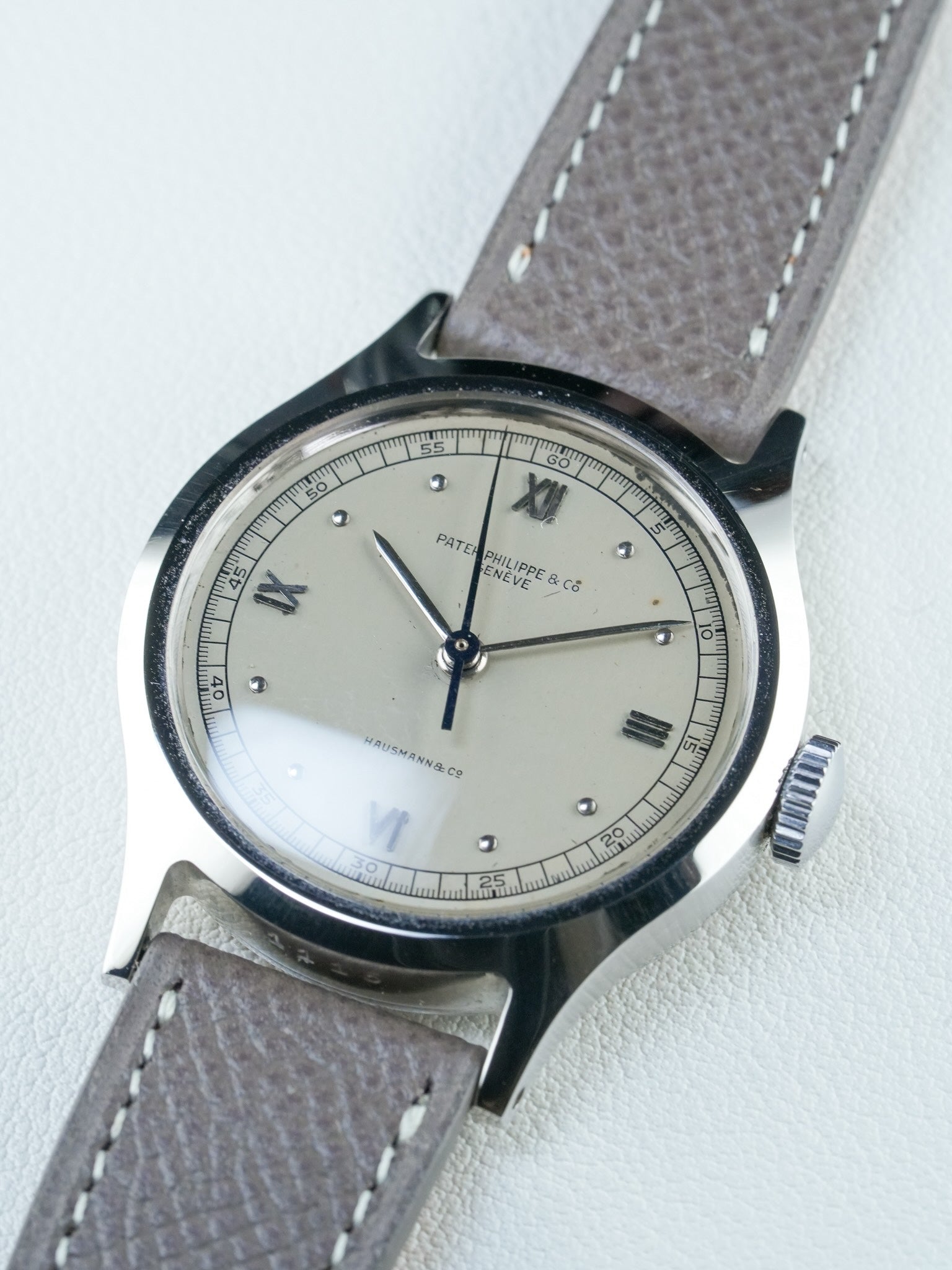 Close-up of Patek Philippe Ref. 565 vintage watch，steel case 