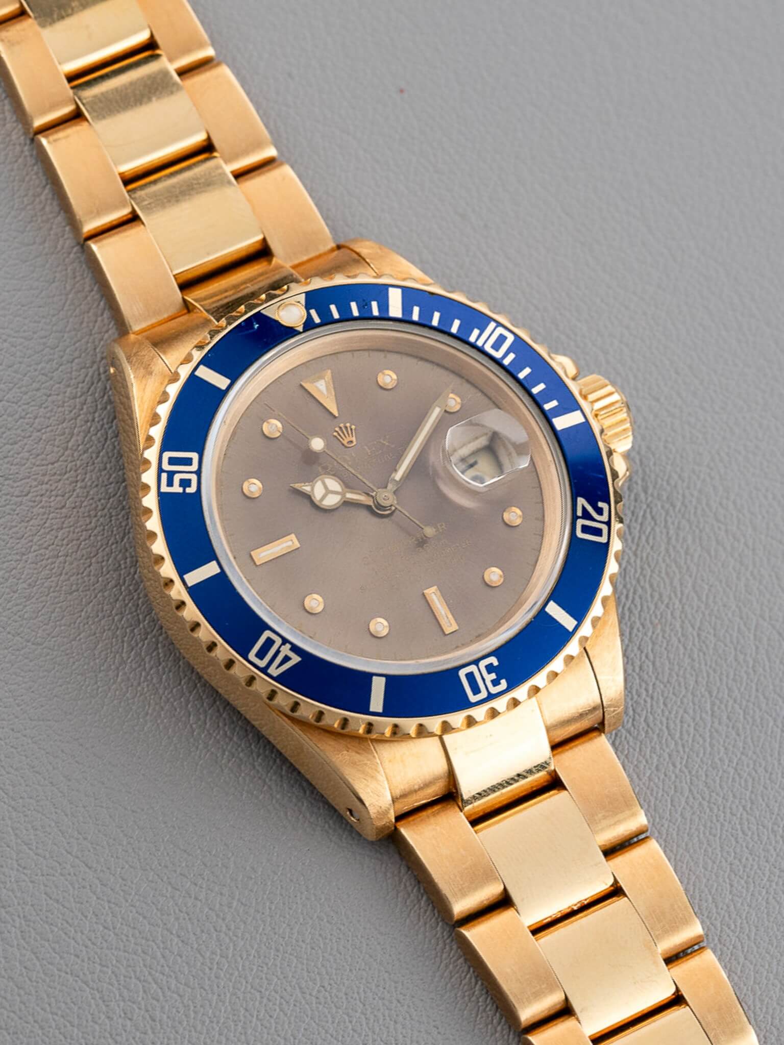 Rolex Submariner 16808 in Yellow Gold Tropical Dial